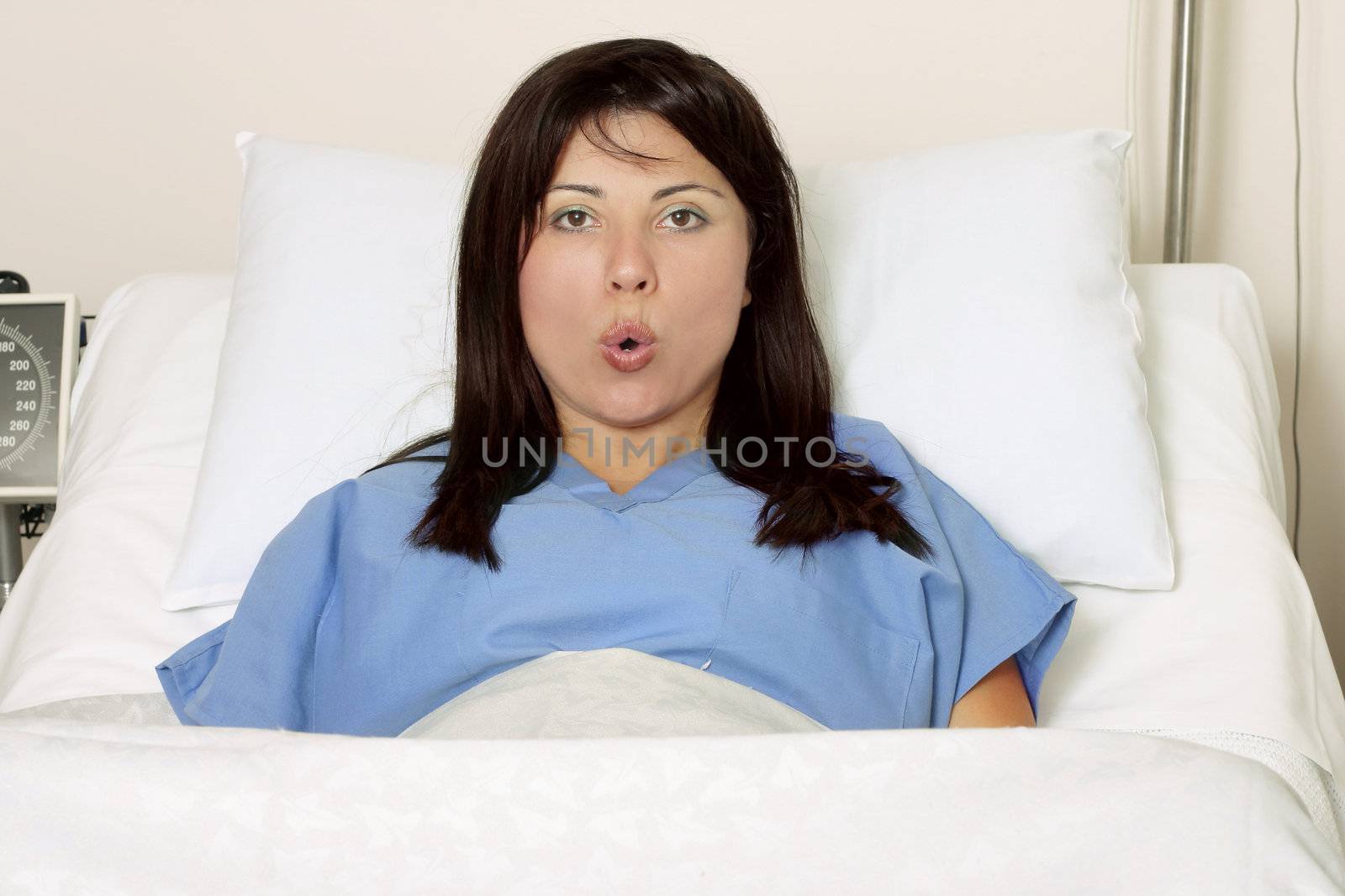 A woman in labour breathing through birth contractions