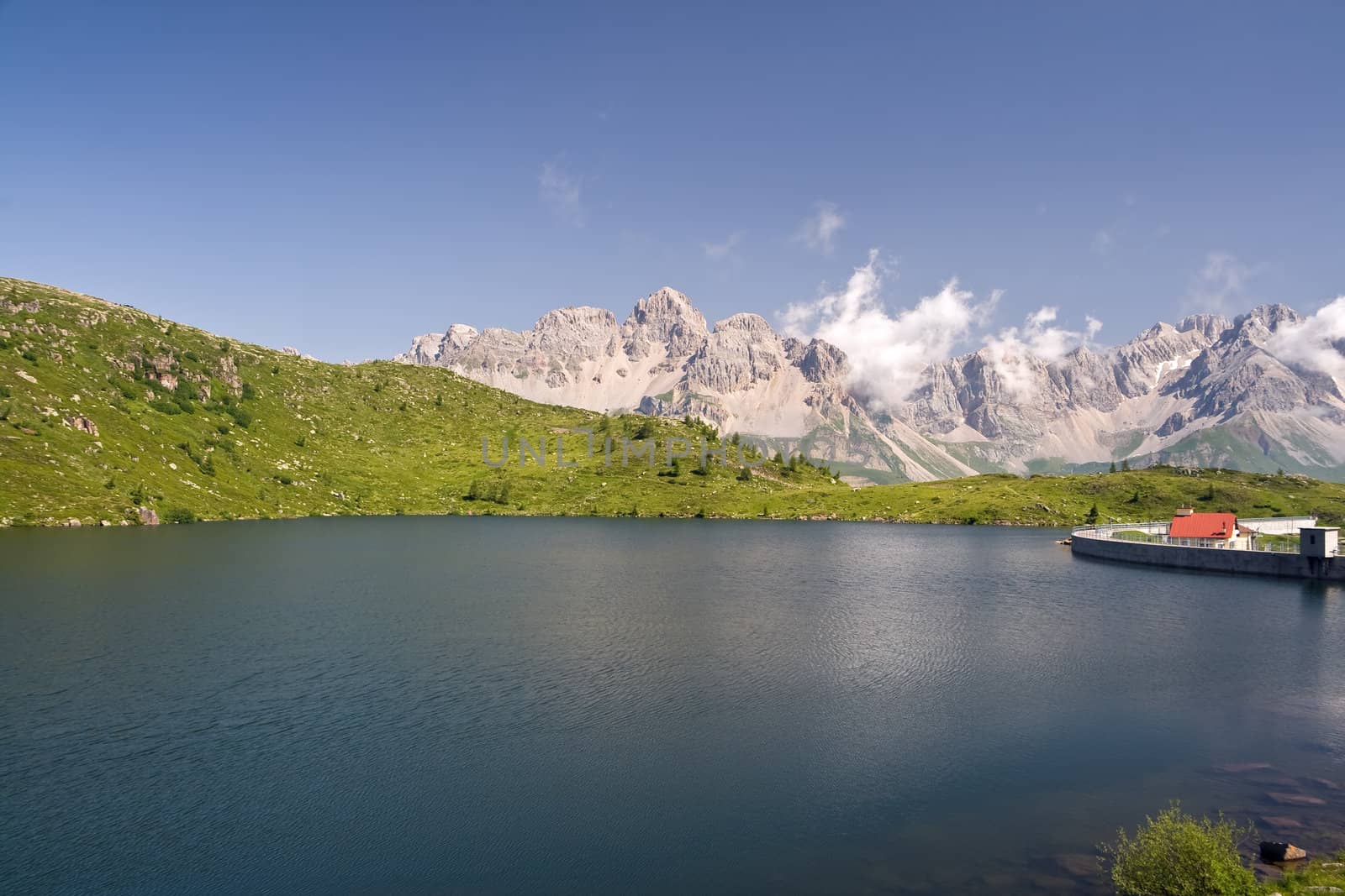 summer view of lake Cavia near San Pellegrino pass, Trentino, Italy 