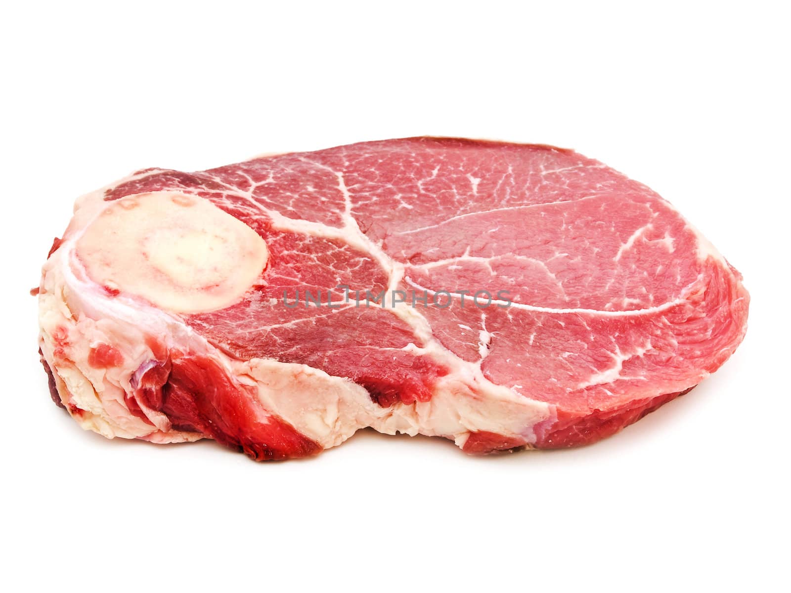Big piece of raw meat against the white background 