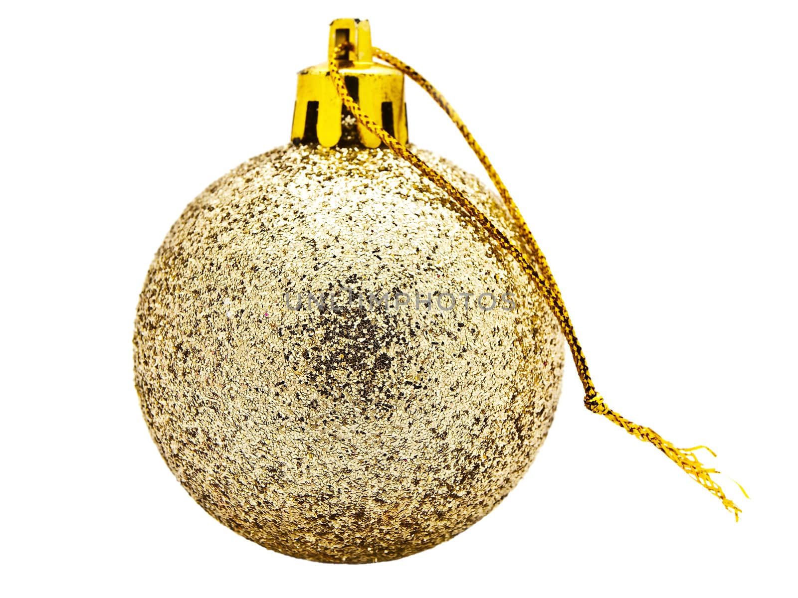 Bright golden New Year toy against white background
