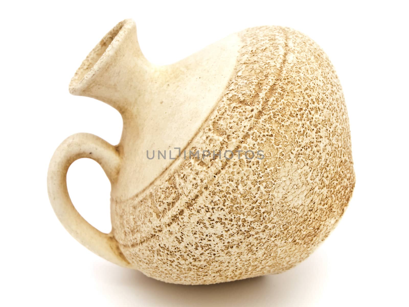 ancient beige vase against white background