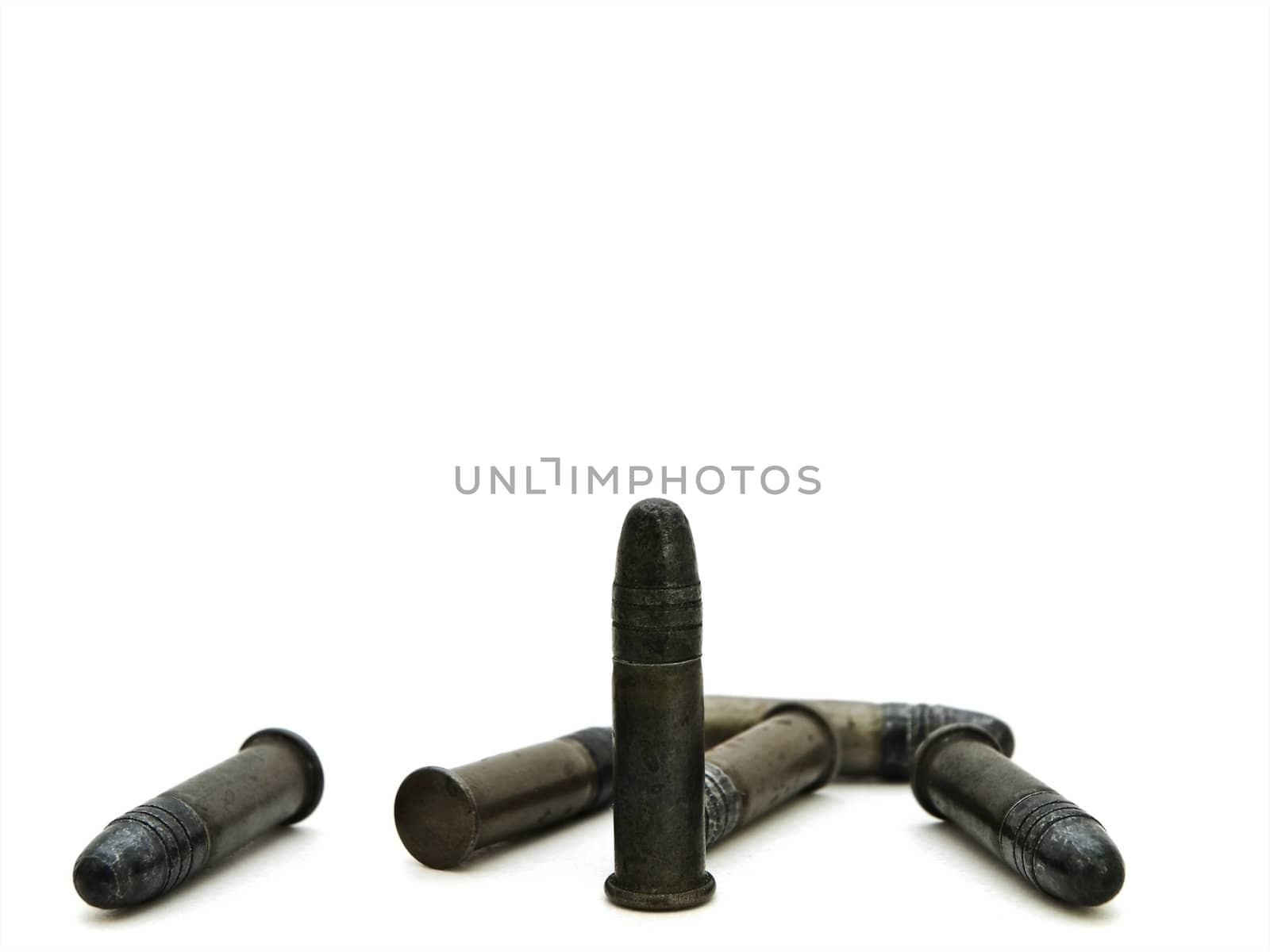 Photo of old metal bullets against white background