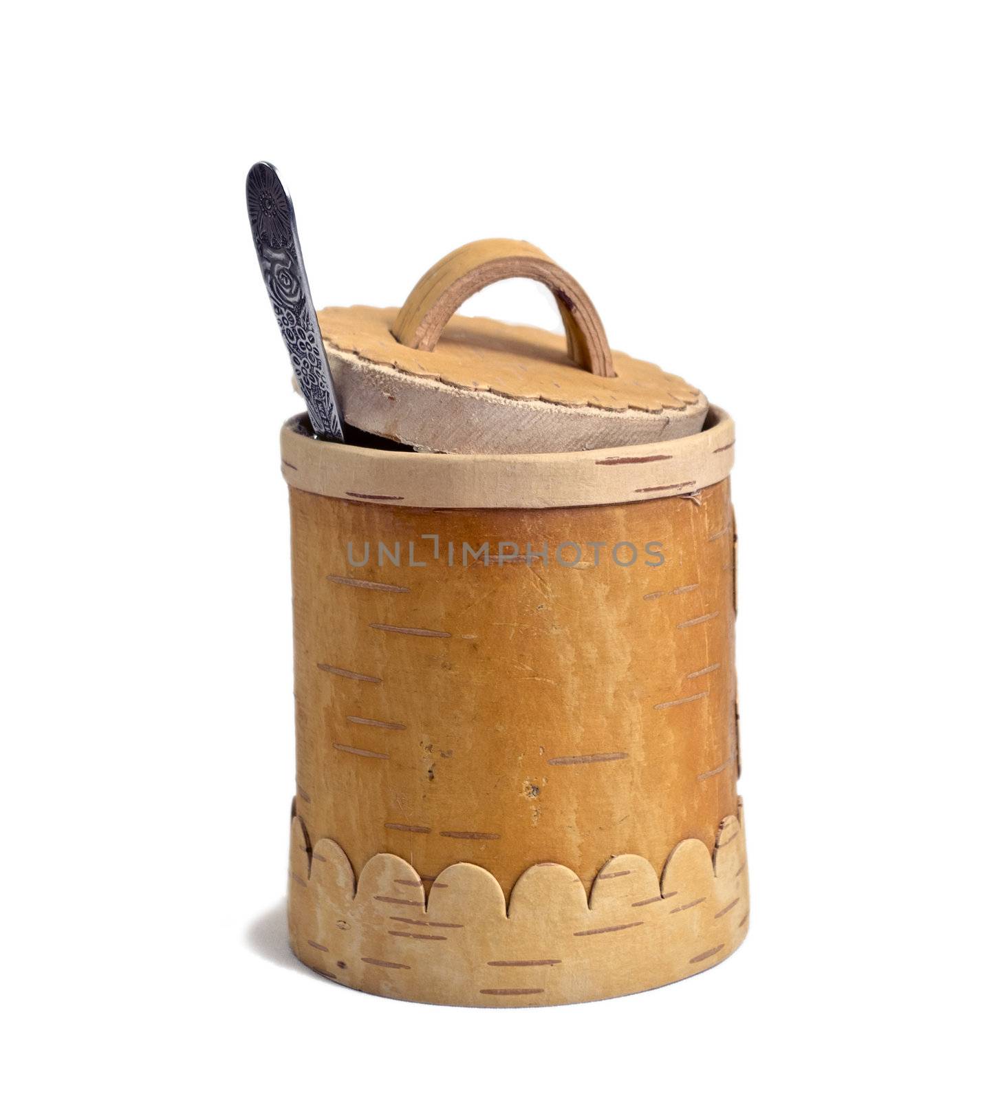 barrel of the honey with spoon on white background, isolated