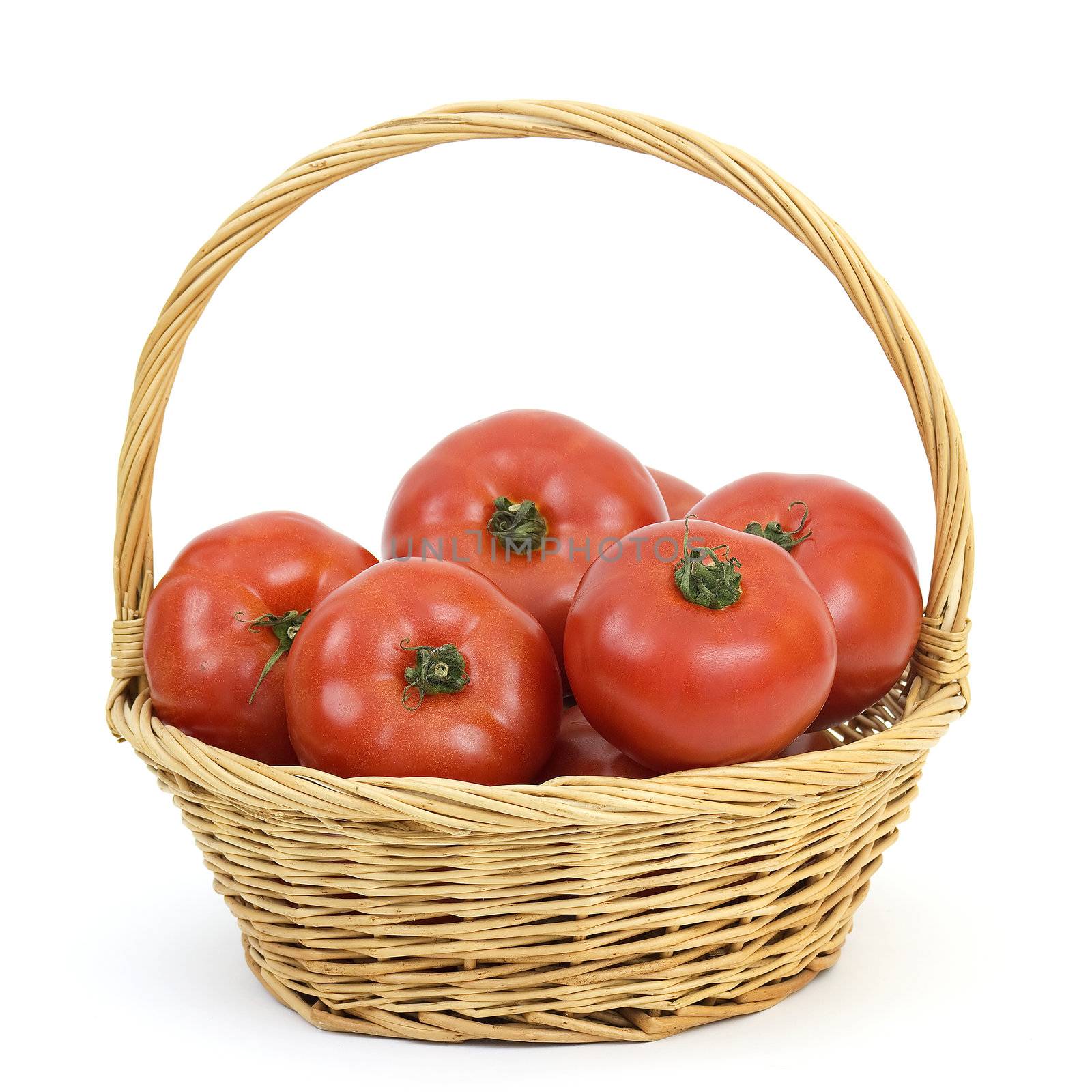 basket full of tomatoes by miradrozdowski