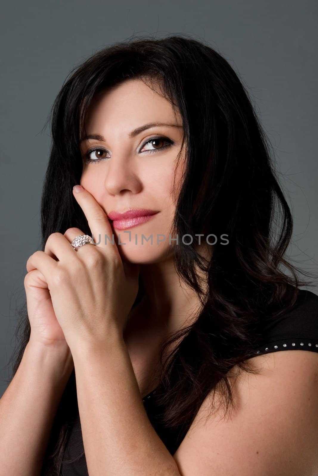 A woman quietly contemplates.