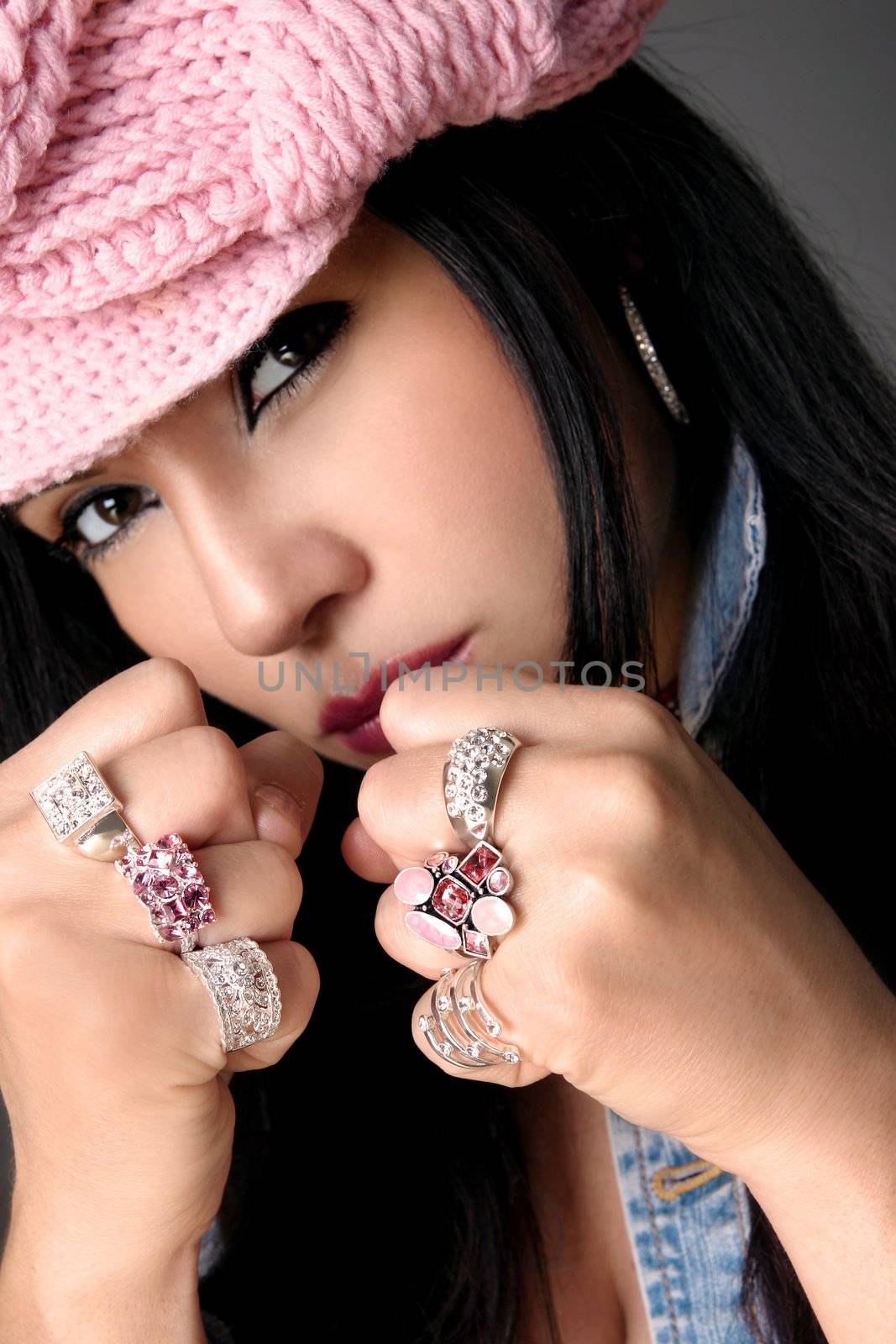 Tomboy with bling.   Focus is the rings