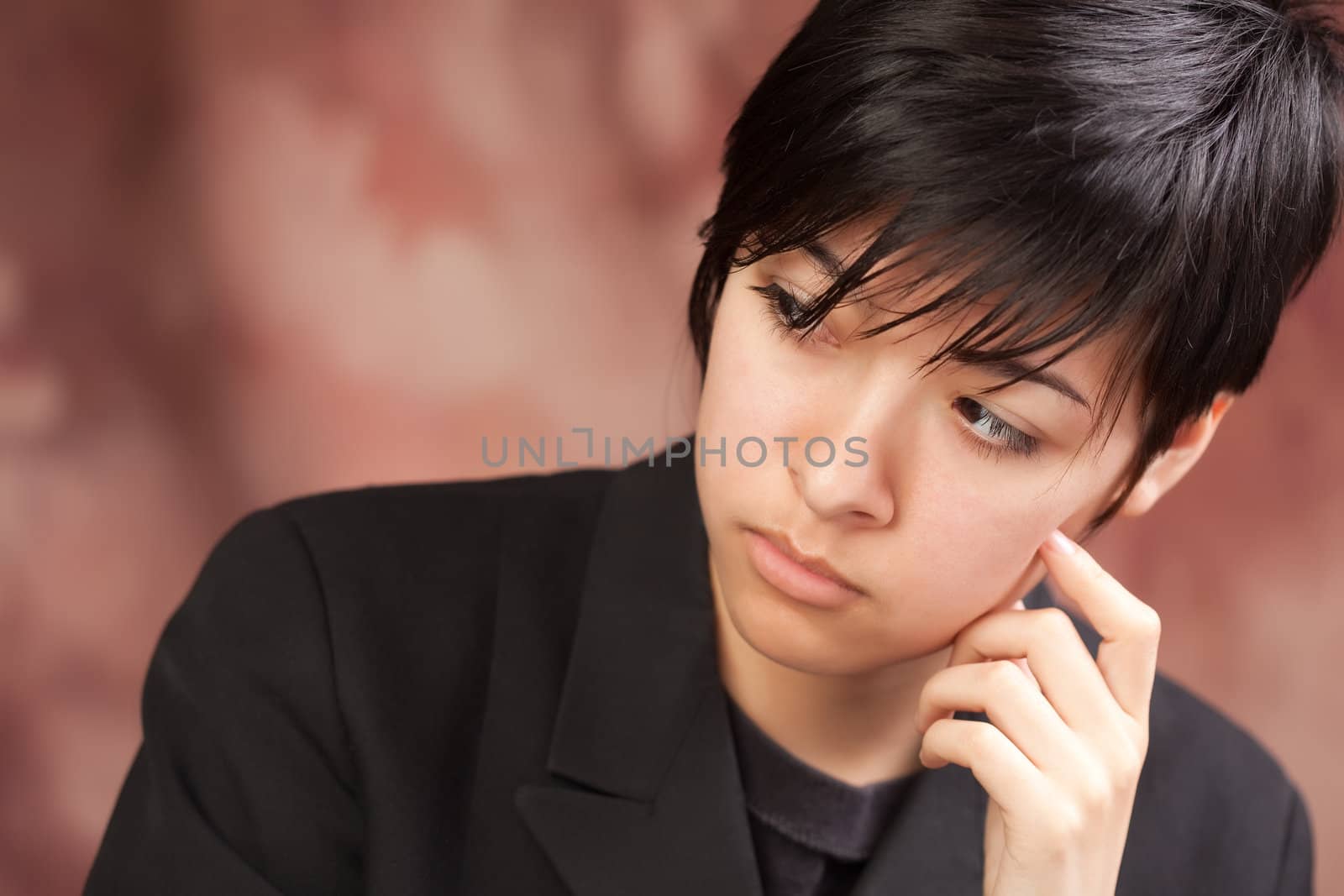 Multiethnic Girl Poses for a Studio Portrait.