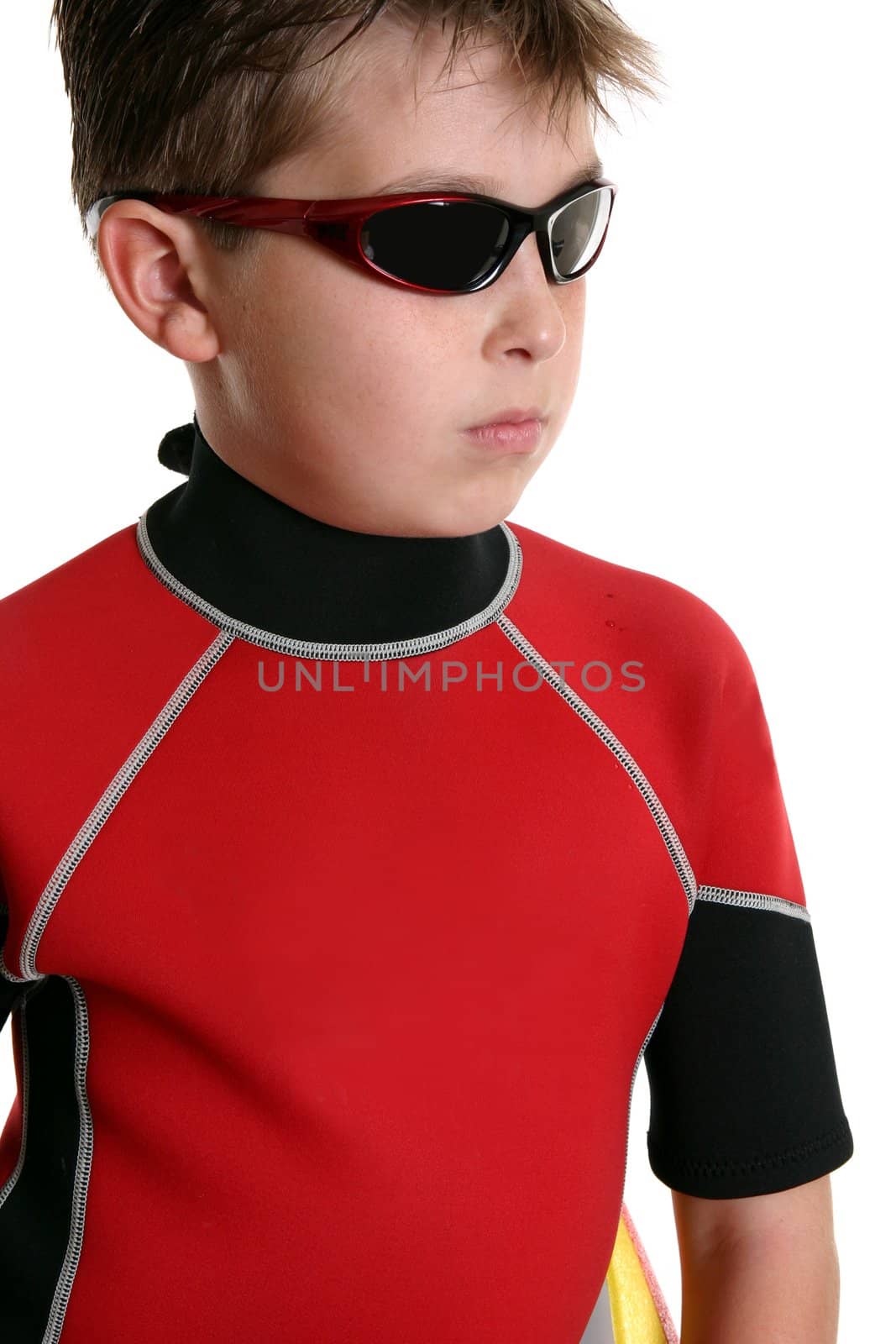 Surfer boy wearing a wetsuit and sunglasses.