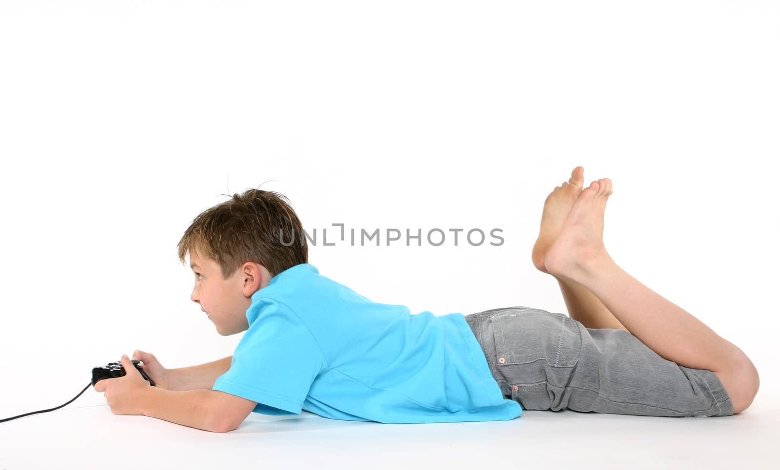 Casually dressed child playing computer games