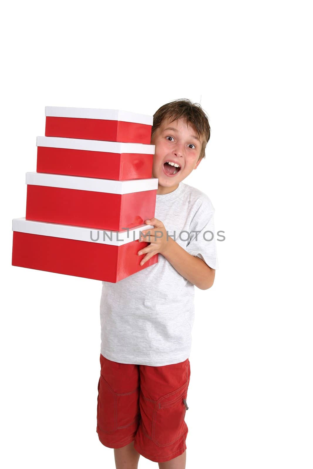 A child carries an array of gift boxes.