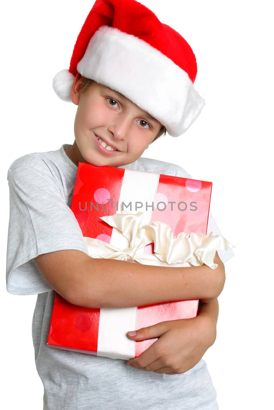 Young child holding a Christmas present