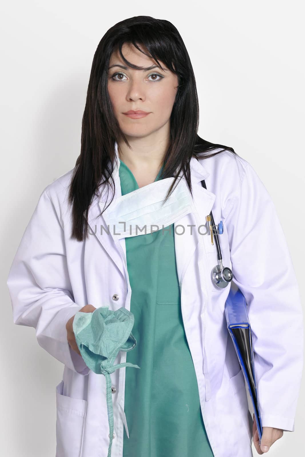 Female Surgeon in green scrubs