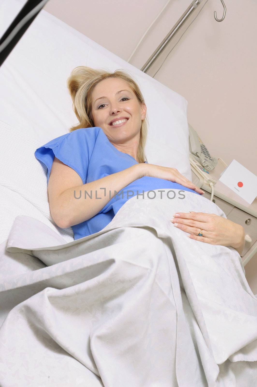 Maternity Ward - Smiling pregnant woman
