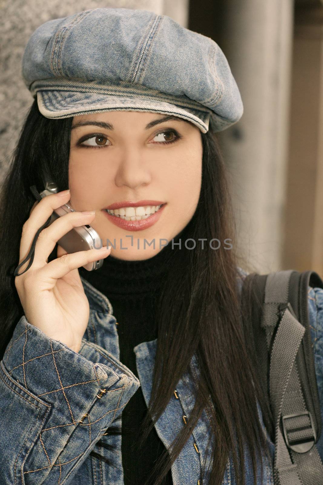 Young woman  or student talking to friends on a mobile phone. 400iso 