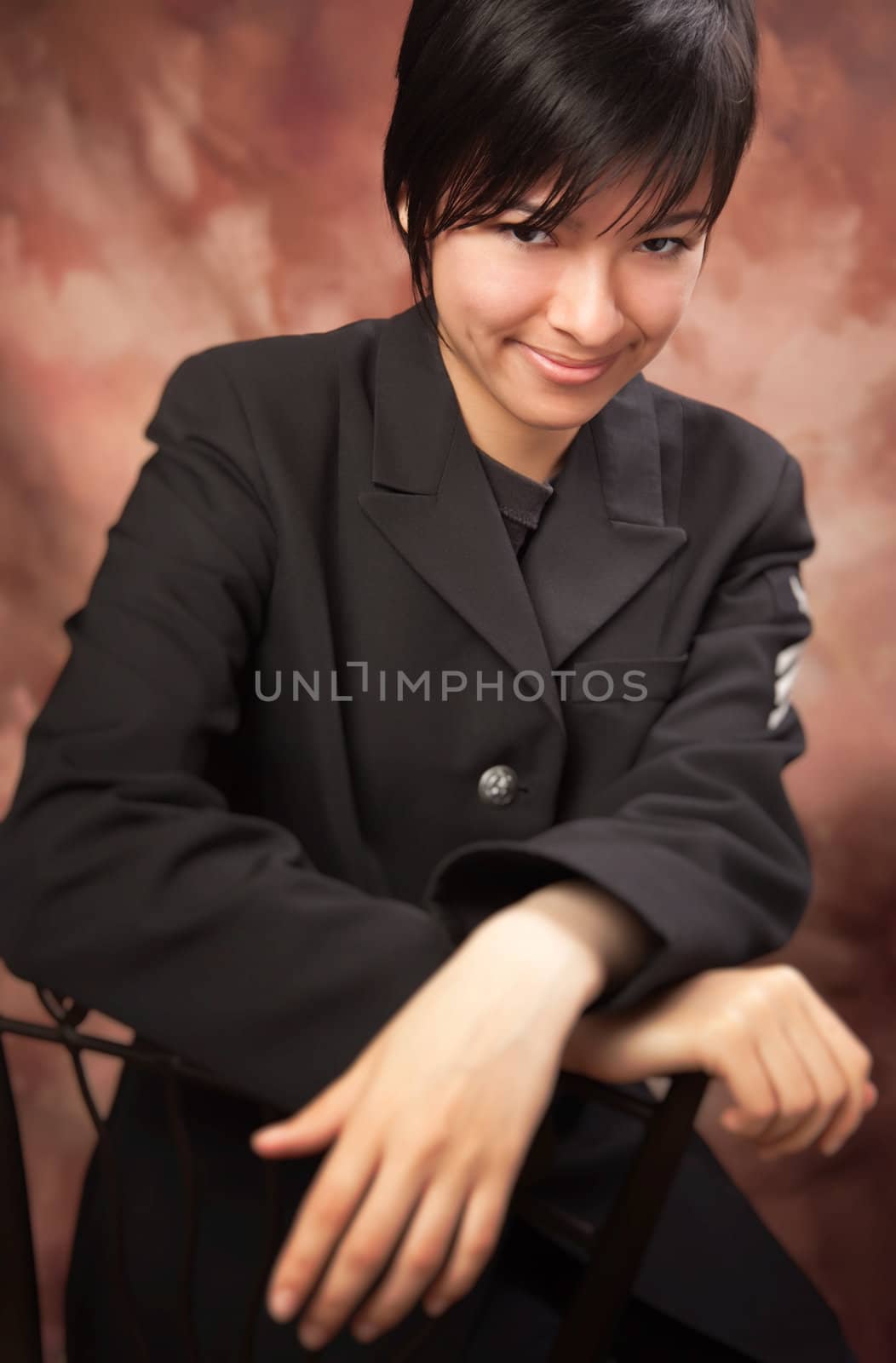 Multiethnic Girl Poses for a Studio Portrait.