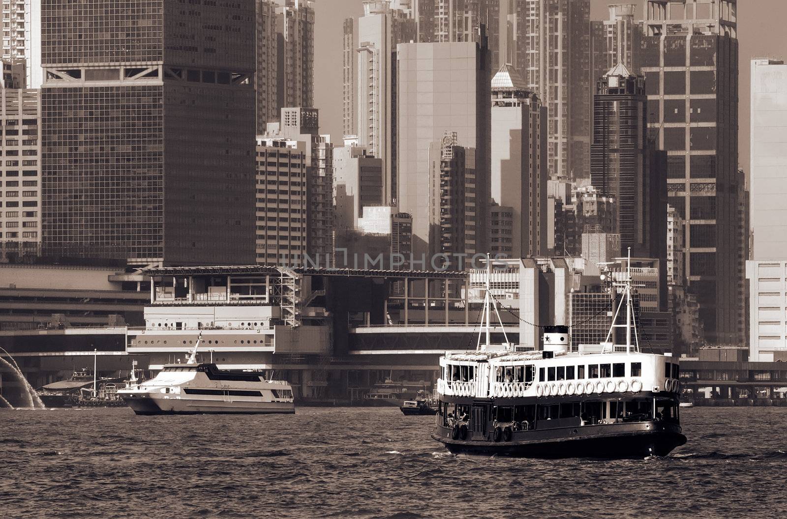 Famous landmark of Hong Kong ferry sailing on Victoria Harbor, Asia.