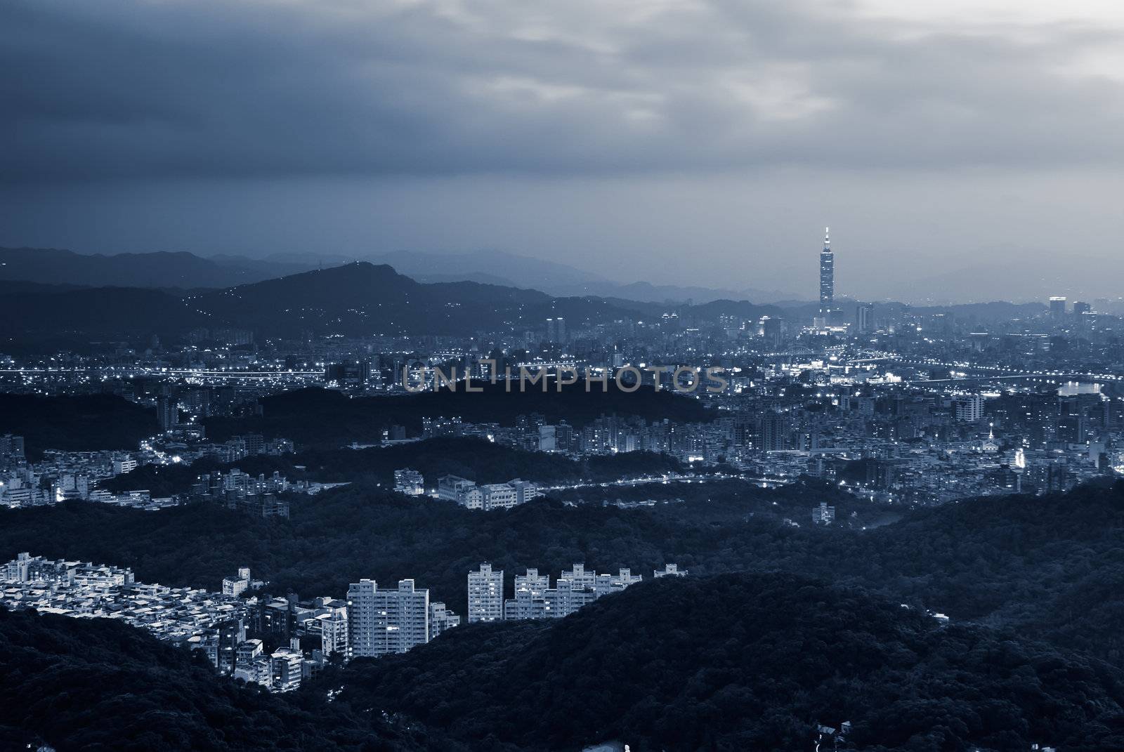 Cityscape of Taipei city night with illuminated buildings and skyline in Taiwan.