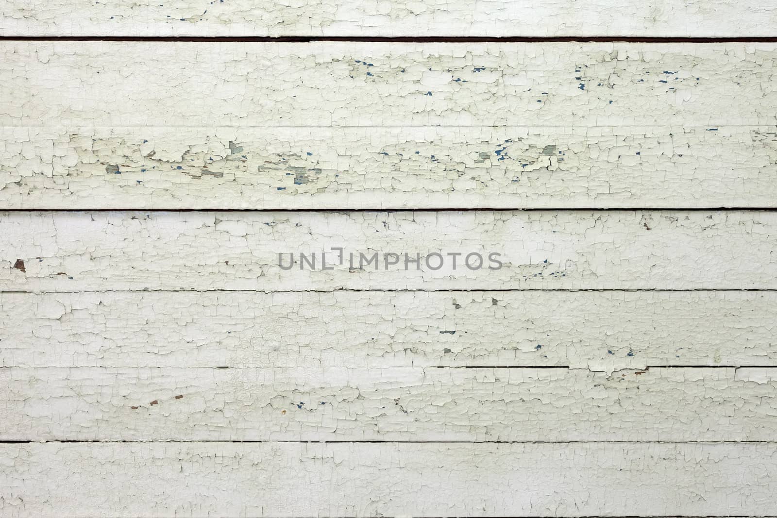 the background of weathered white painted wood