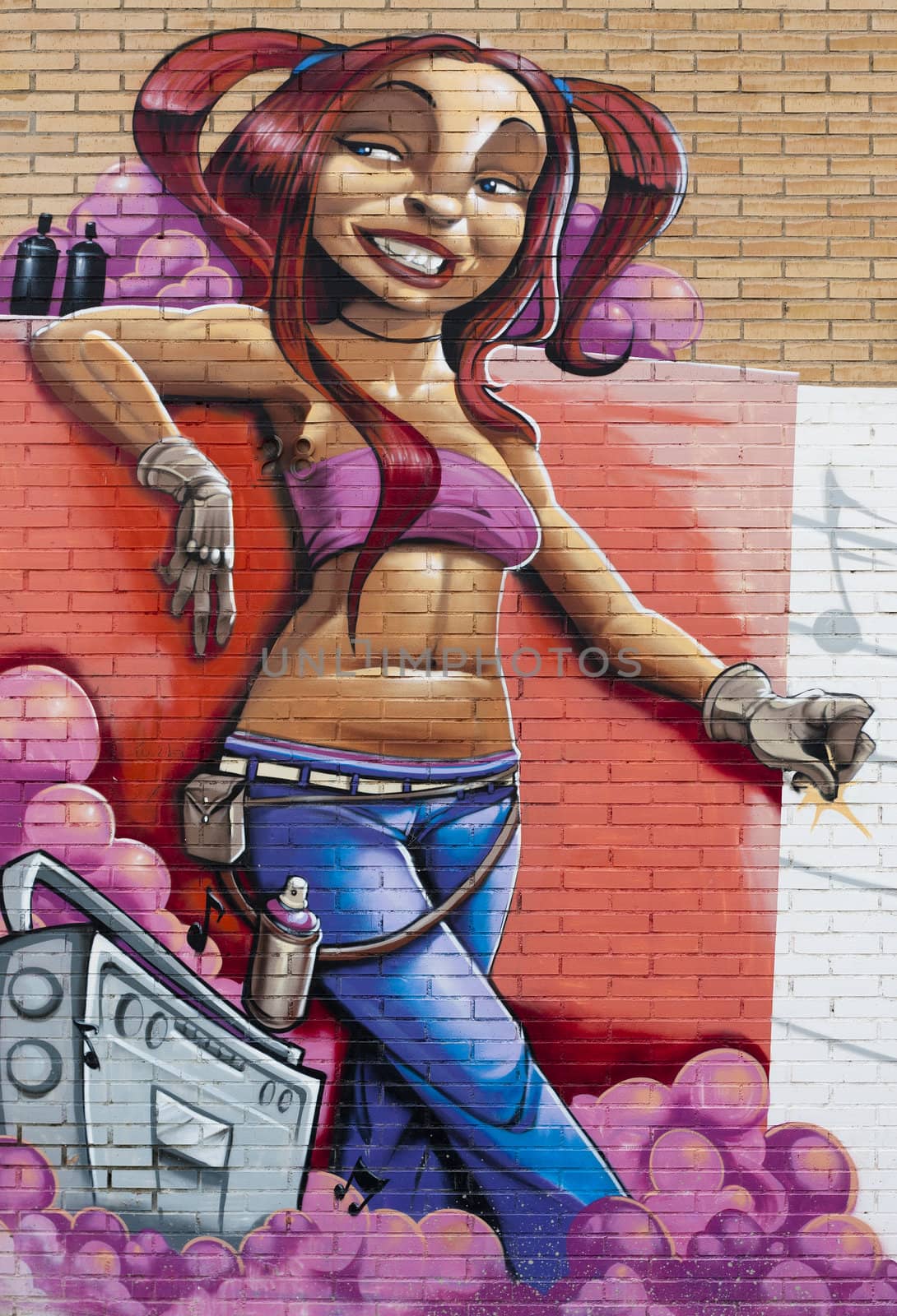 Graffiti of teenage girl listening to music and snapping her fingers while taking a break from graffiti painting.