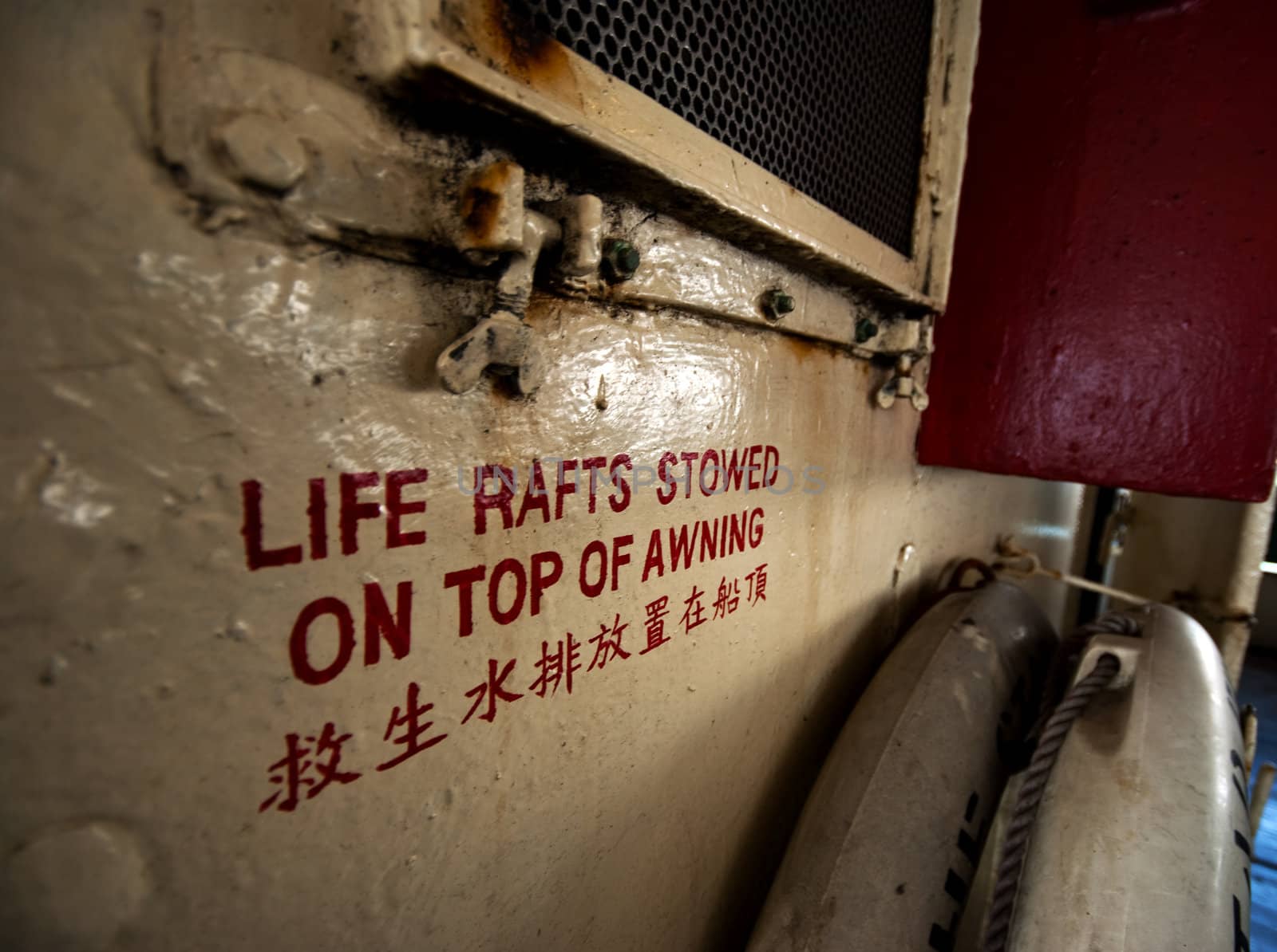 safety text on a boat in hong kong in english and chinese