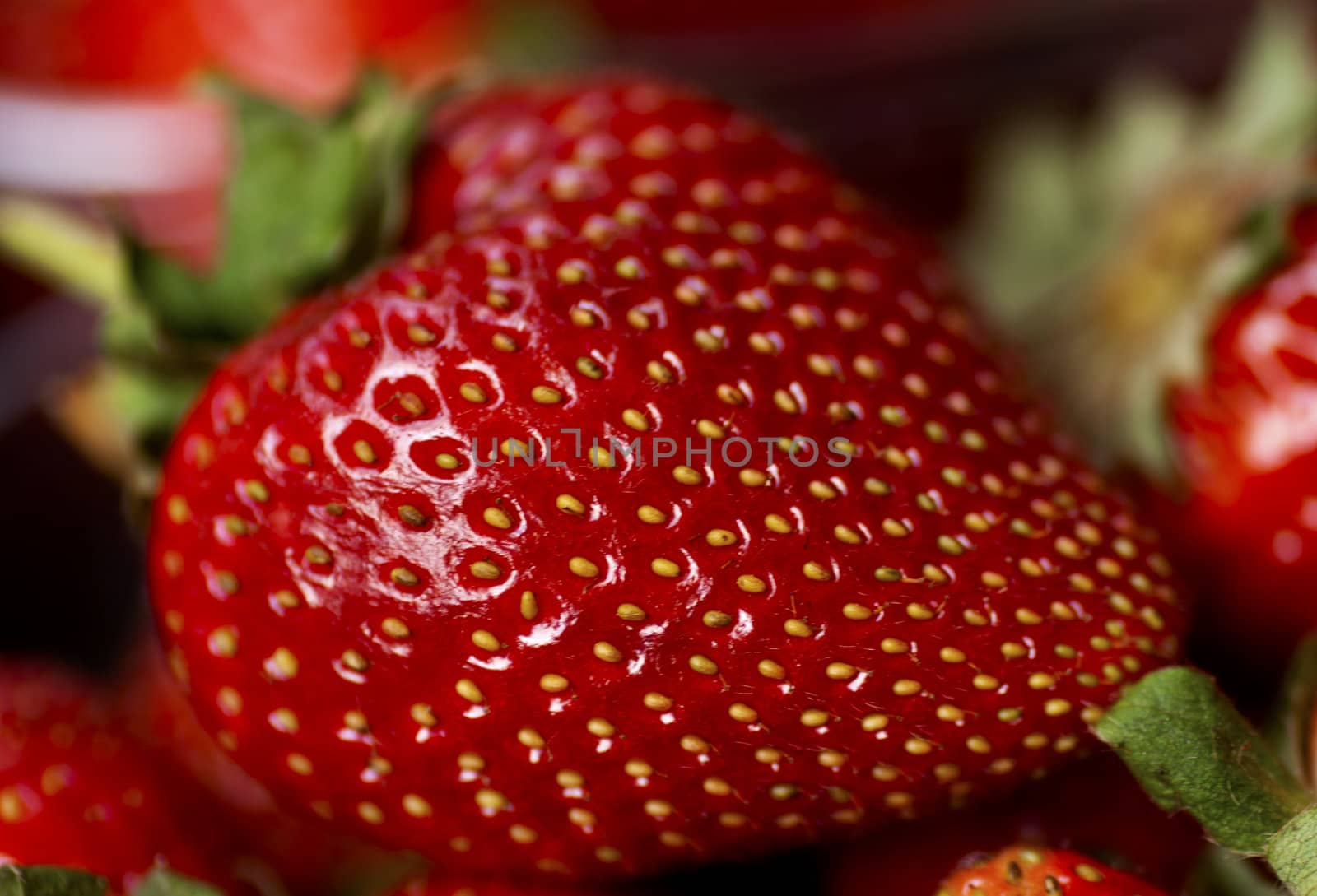 a closeup of a delicious red strawberry