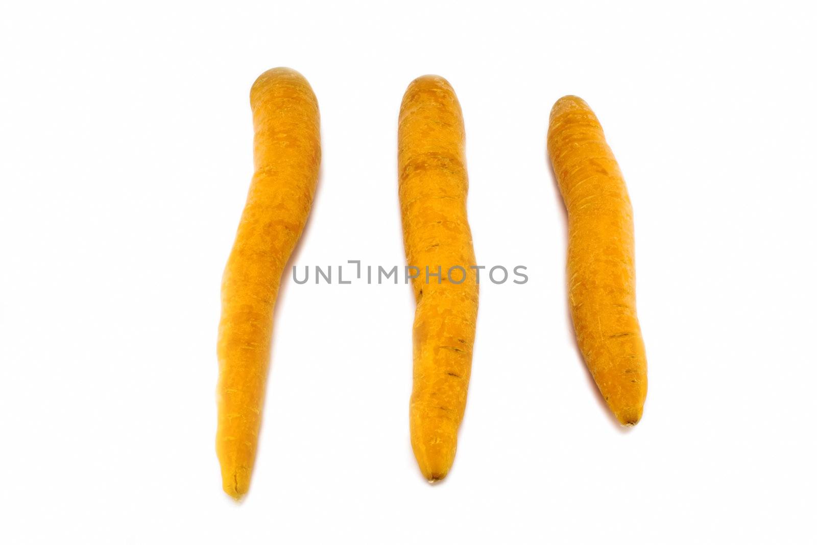 Three carrots isolated on white