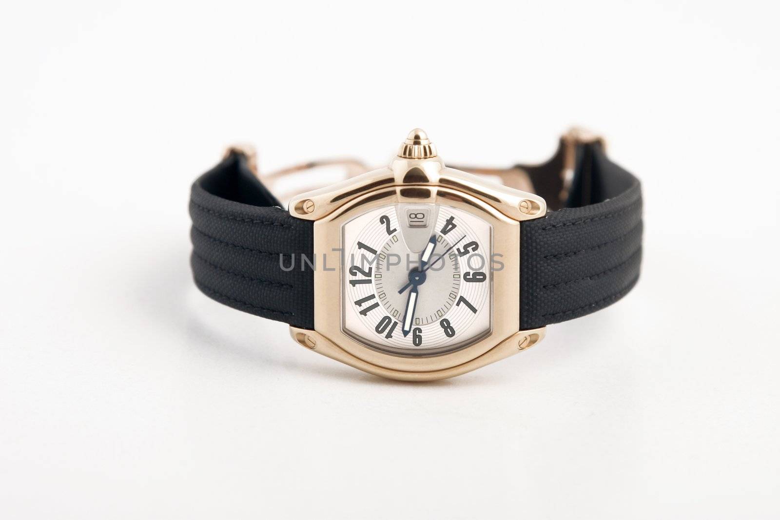 front view of black strap and gold watch