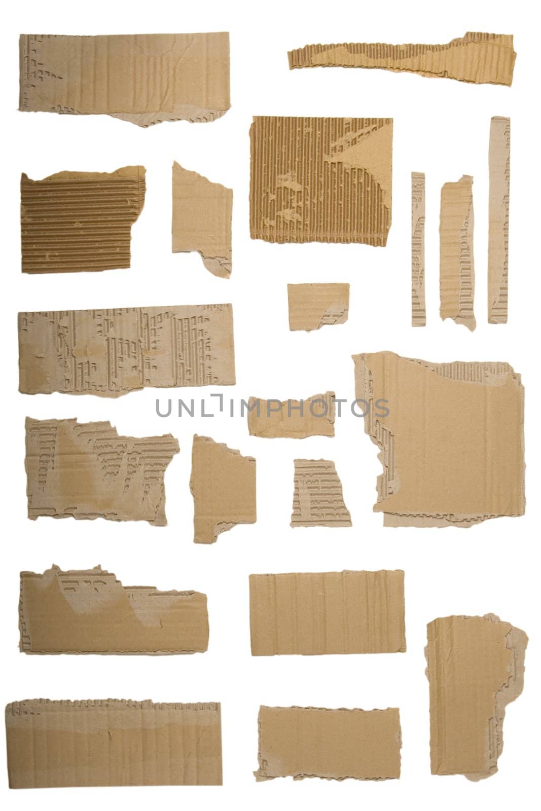 Pieces of torn brown corrugated cardboard, Isolated on White Background