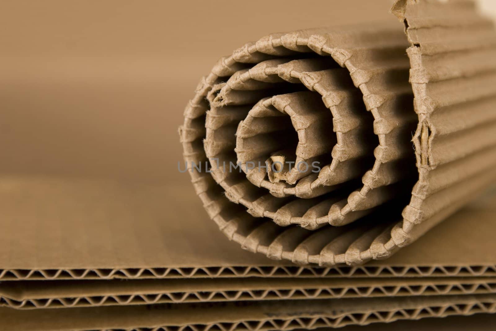 close-up of spiral made from brown cardboard