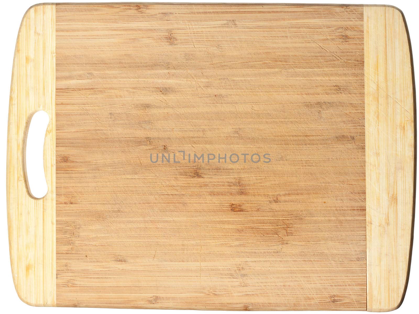 Isolated used wooden cutting board. Clipping path included