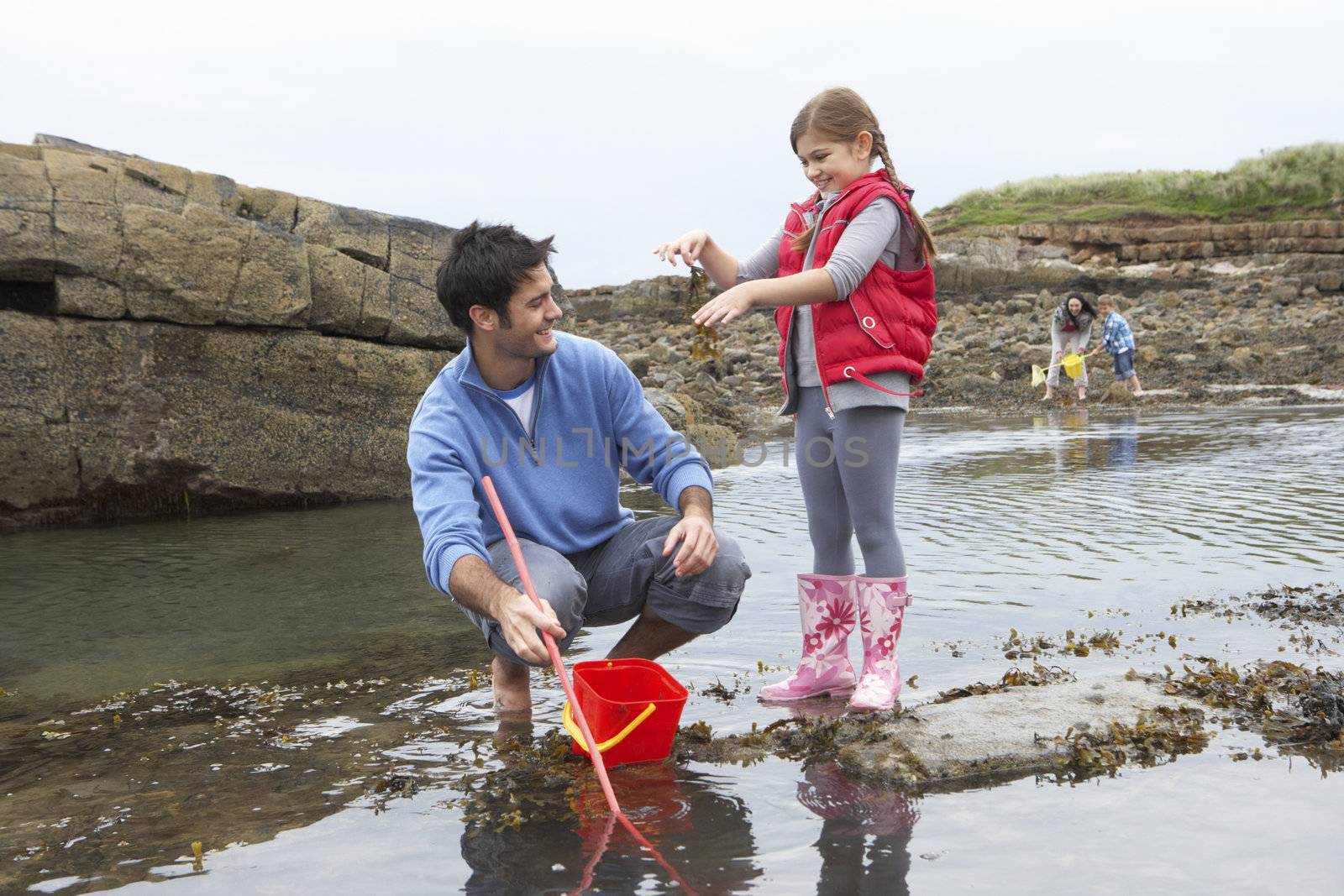 Family with seaweed by omg_images