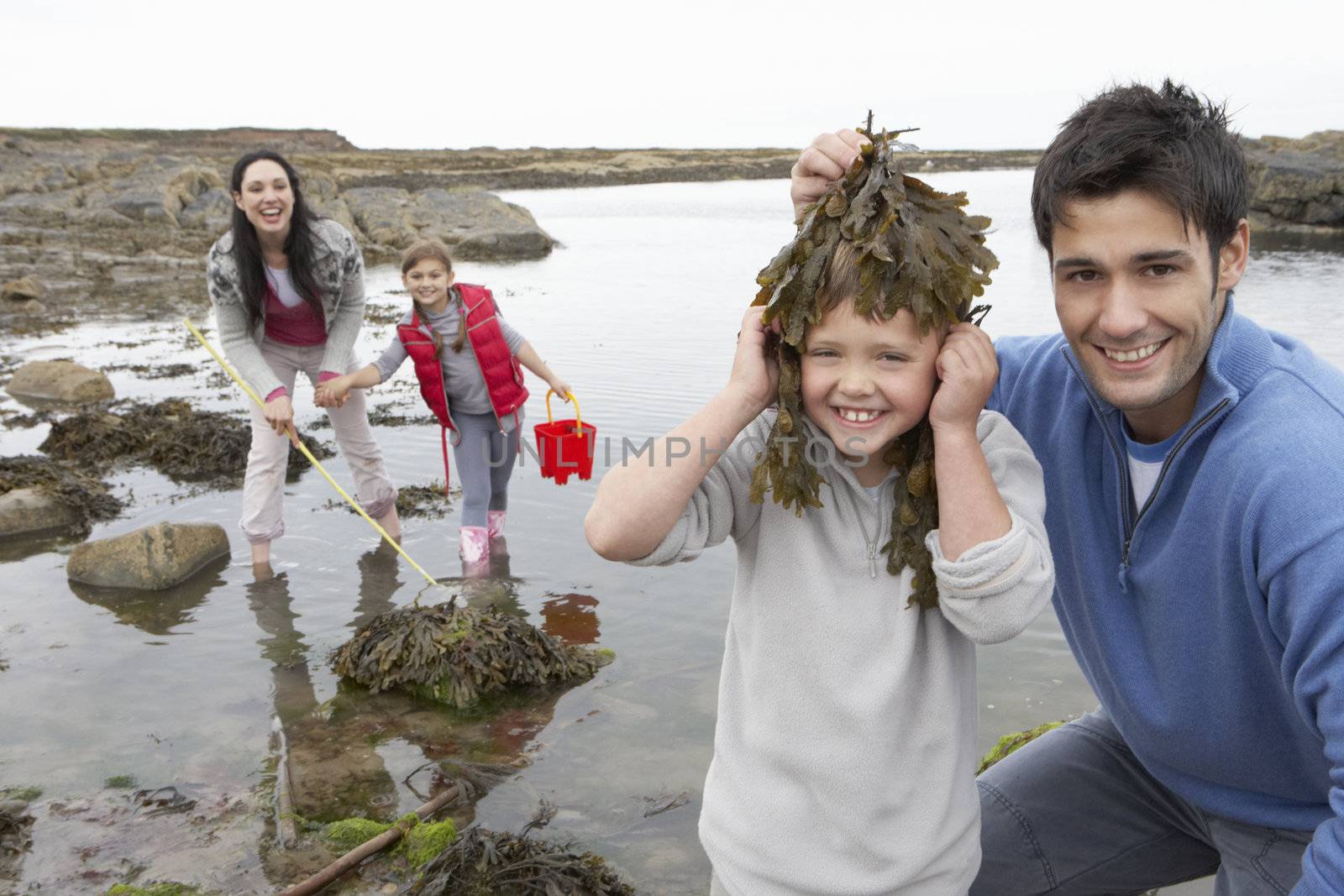Family with seaweed by omg_images