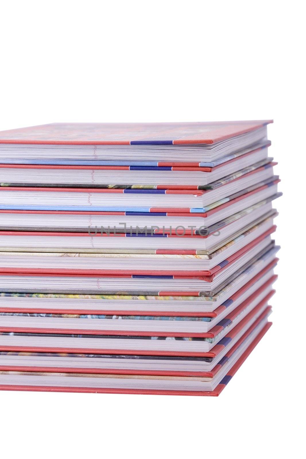 color tower books on white background arranged in stack