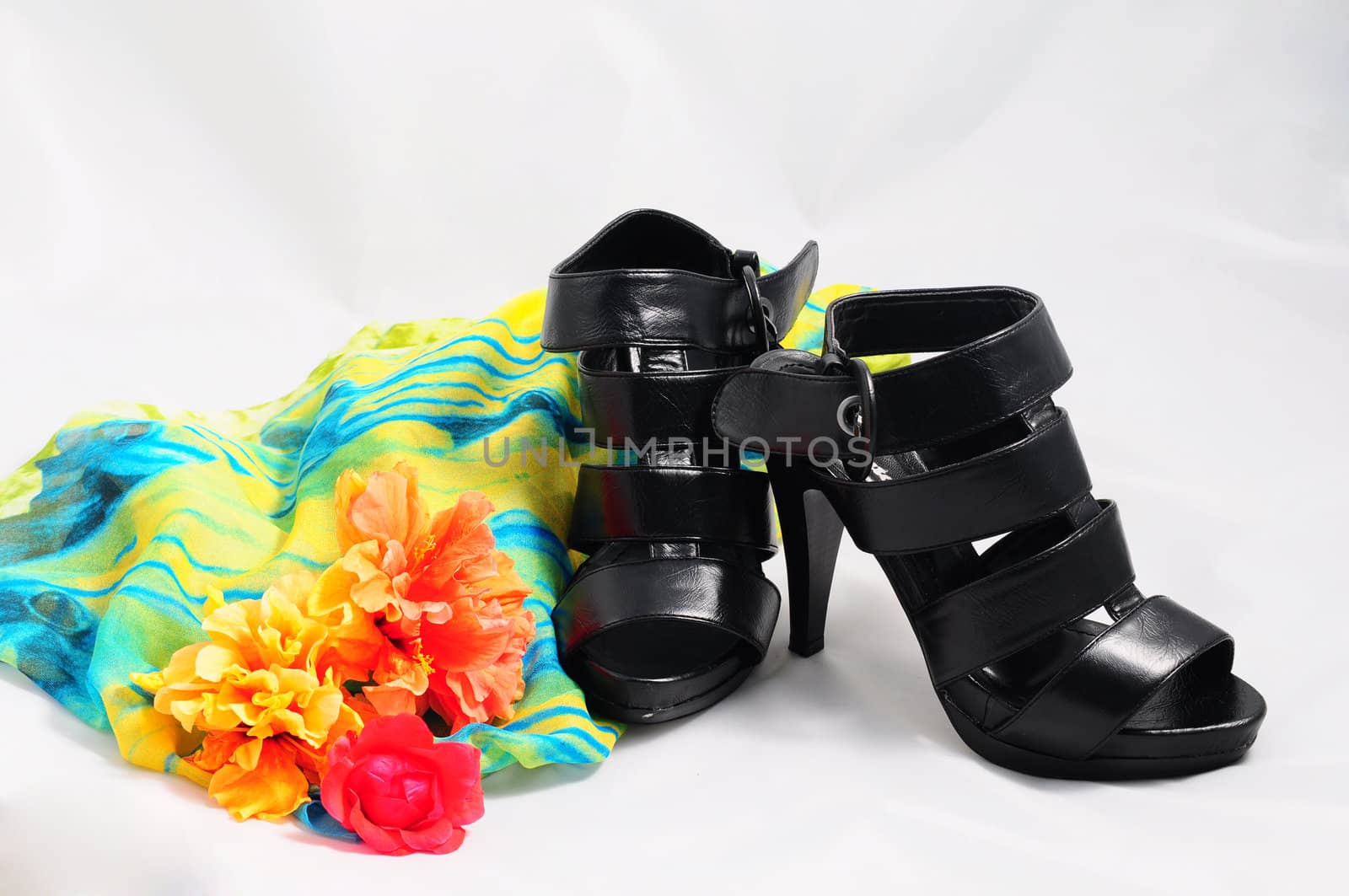 Ladies' black sandals and  blue handkerchief .