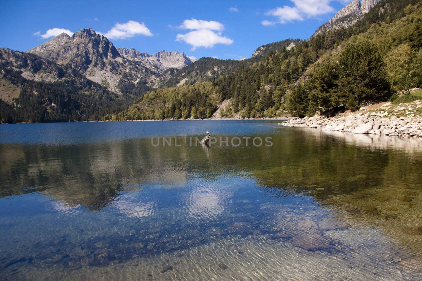 Summer day in Pyrenees. Sant Maurici lake.