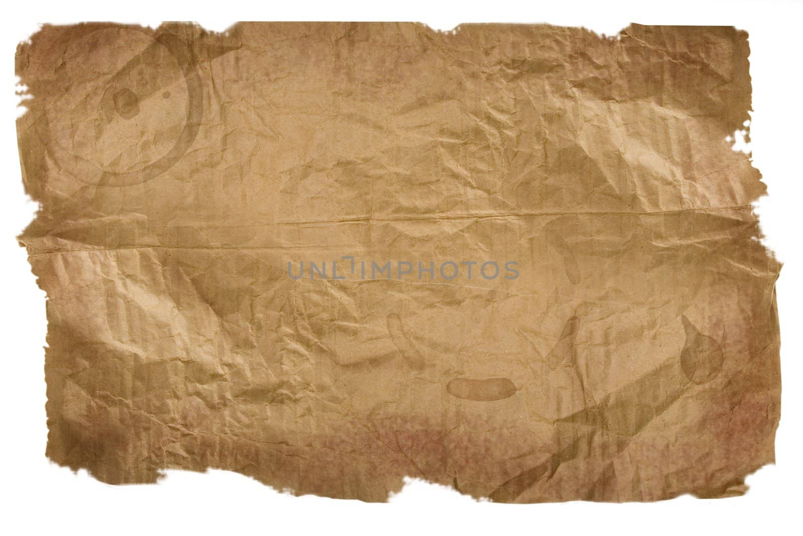 Piece of brown paper, torn on white background