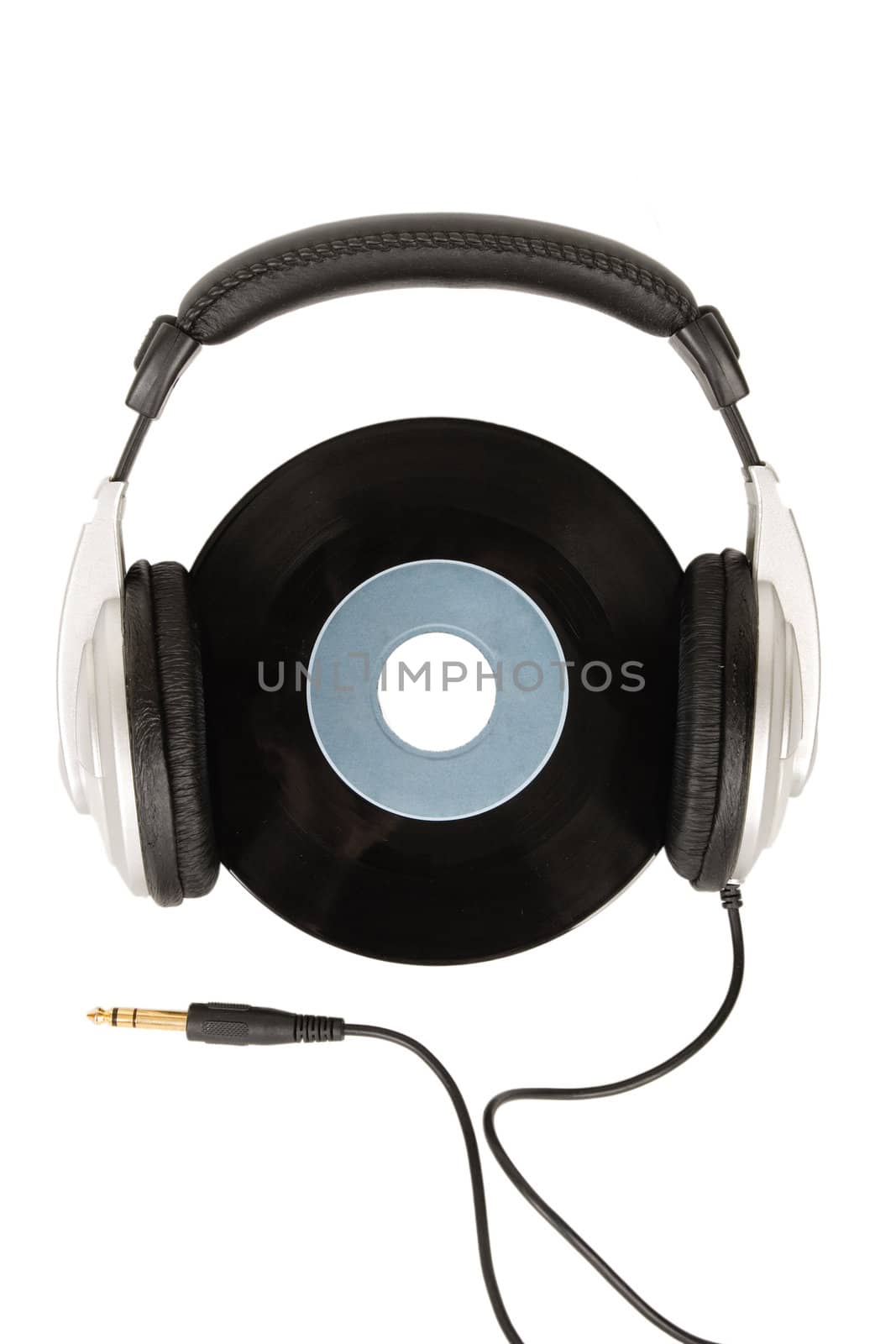 front view of dj headphones and vintage vinyl