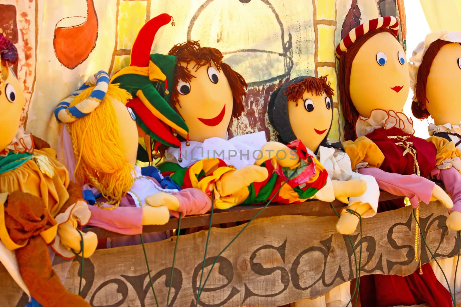 Group of colorful little puppets in the puppet theater