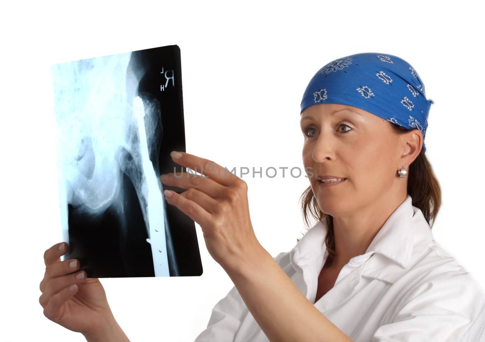 female doctor looking at a xray with white background