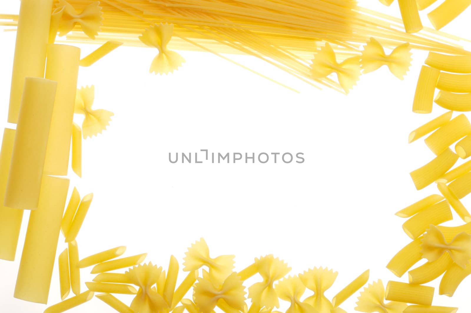 different dry pasta on white background