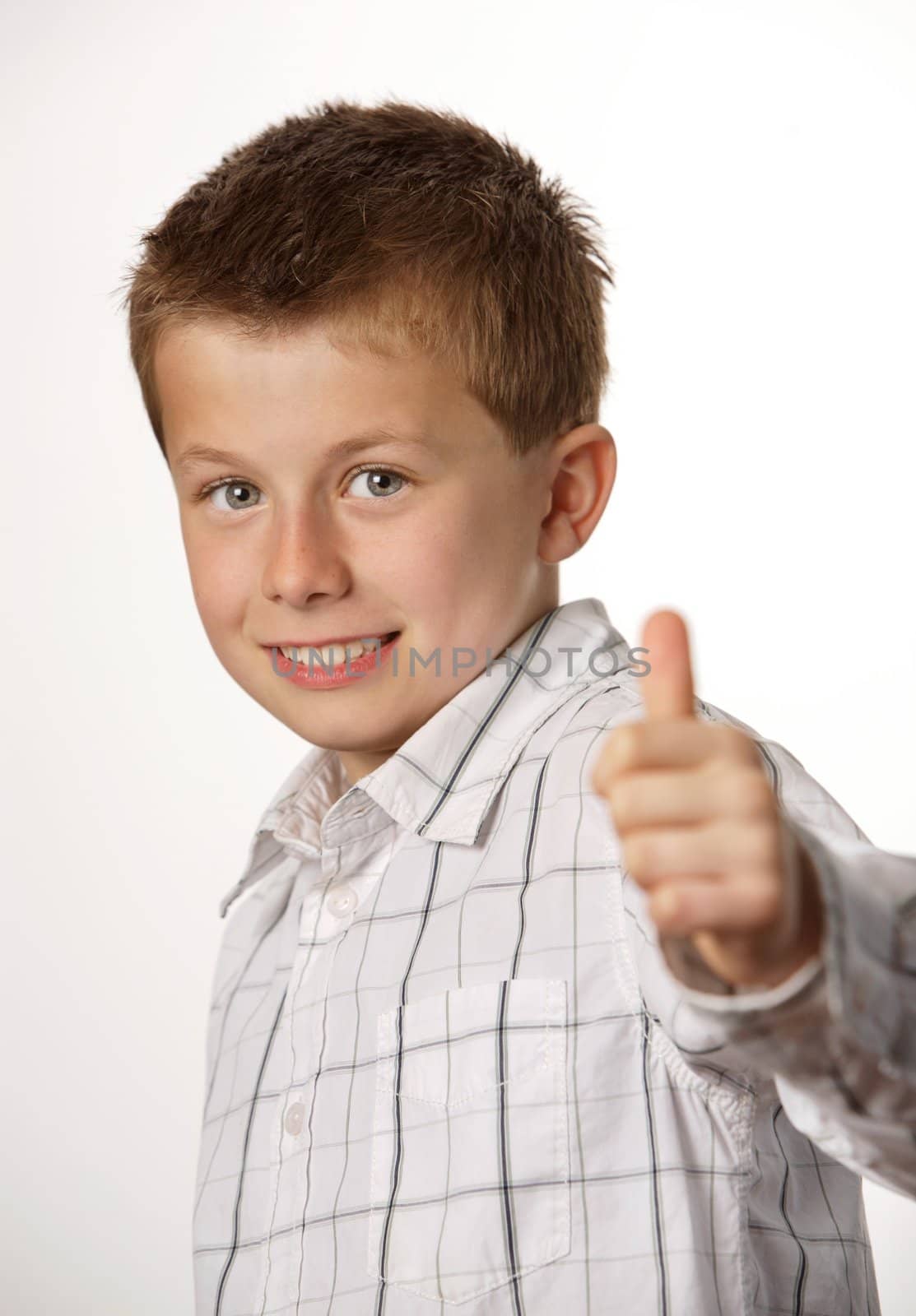 young boy with thumb up by RainerPlendl