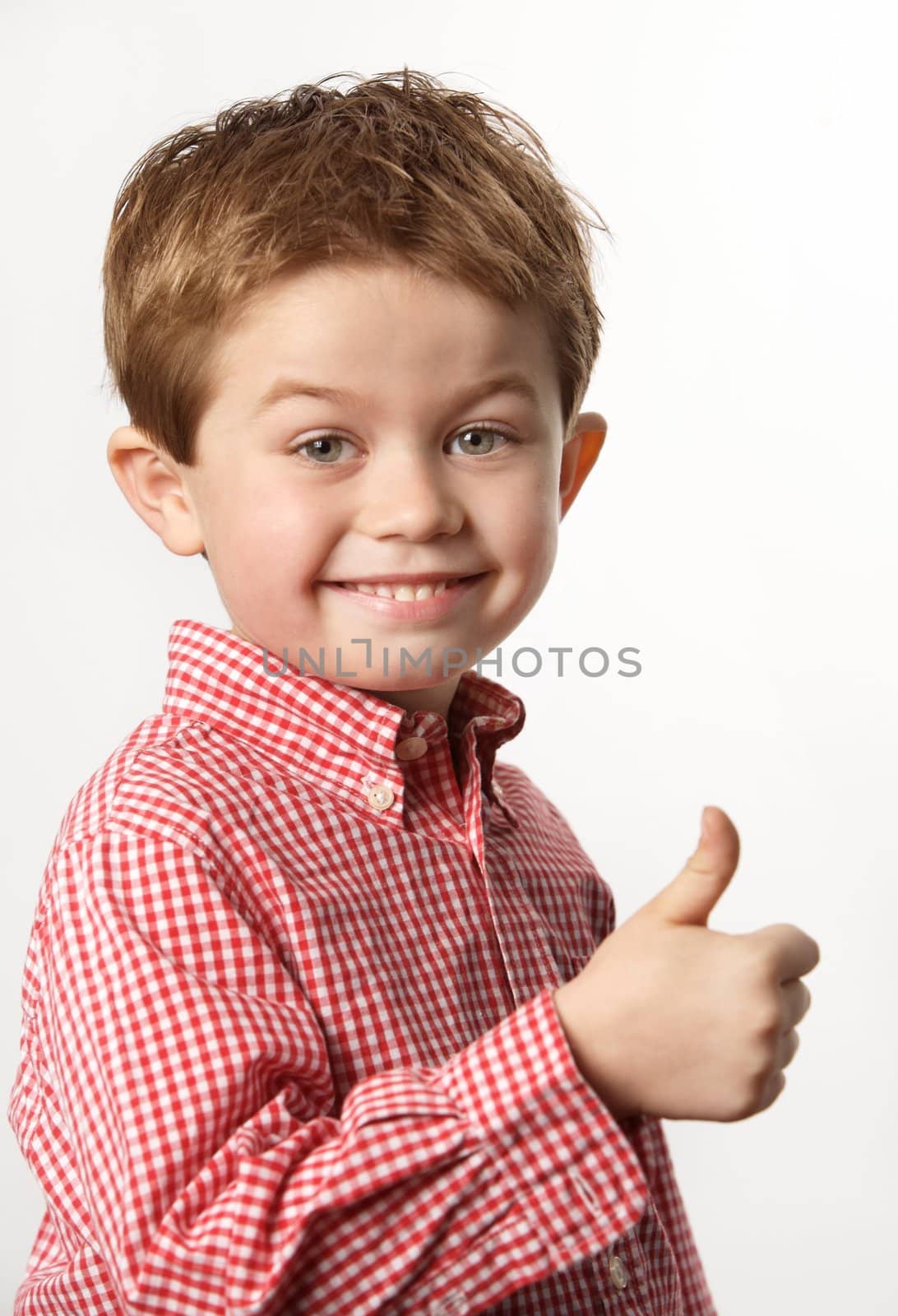 young boy with thumb up by RainerPlendl