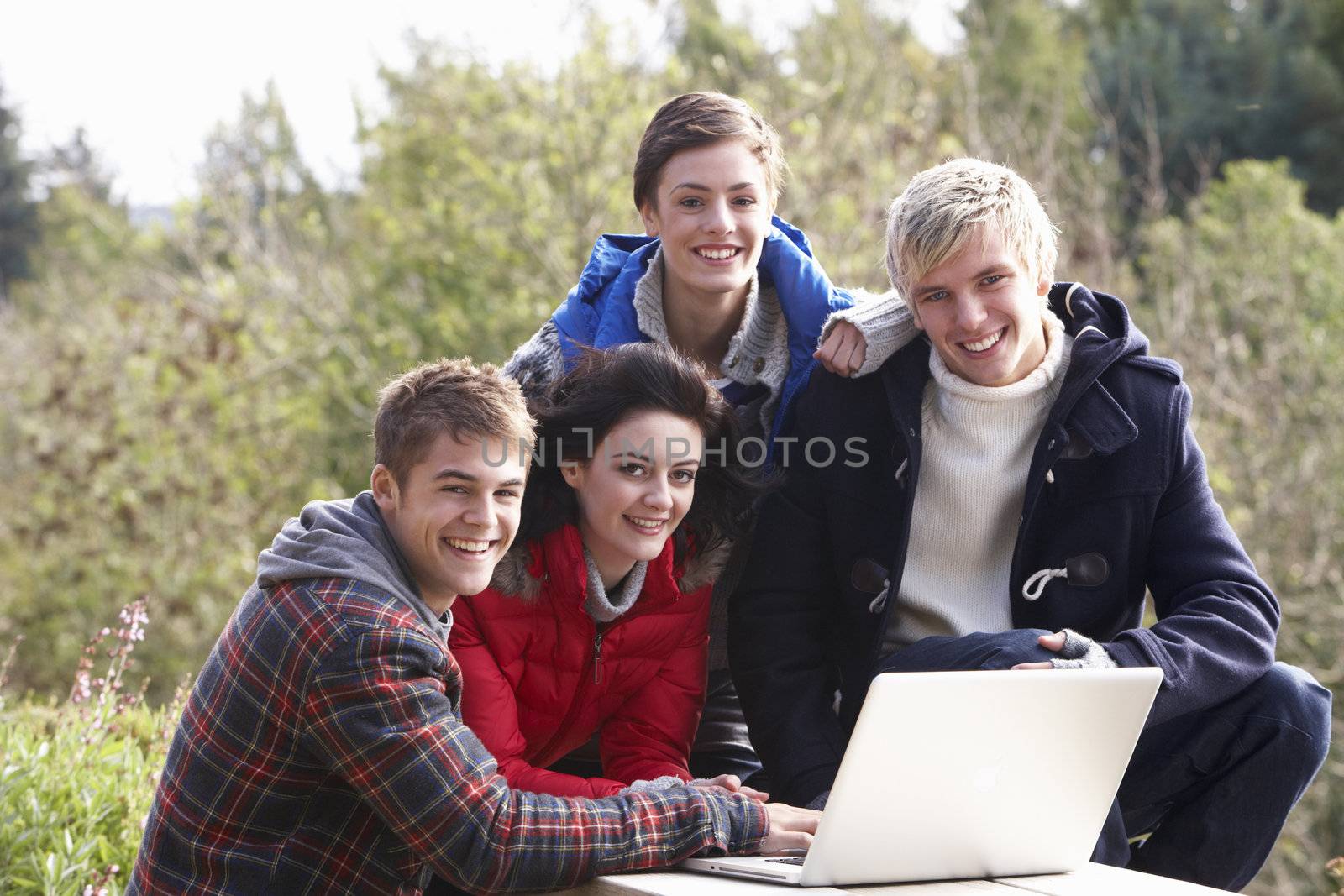 Students with laptop computer by omg_images