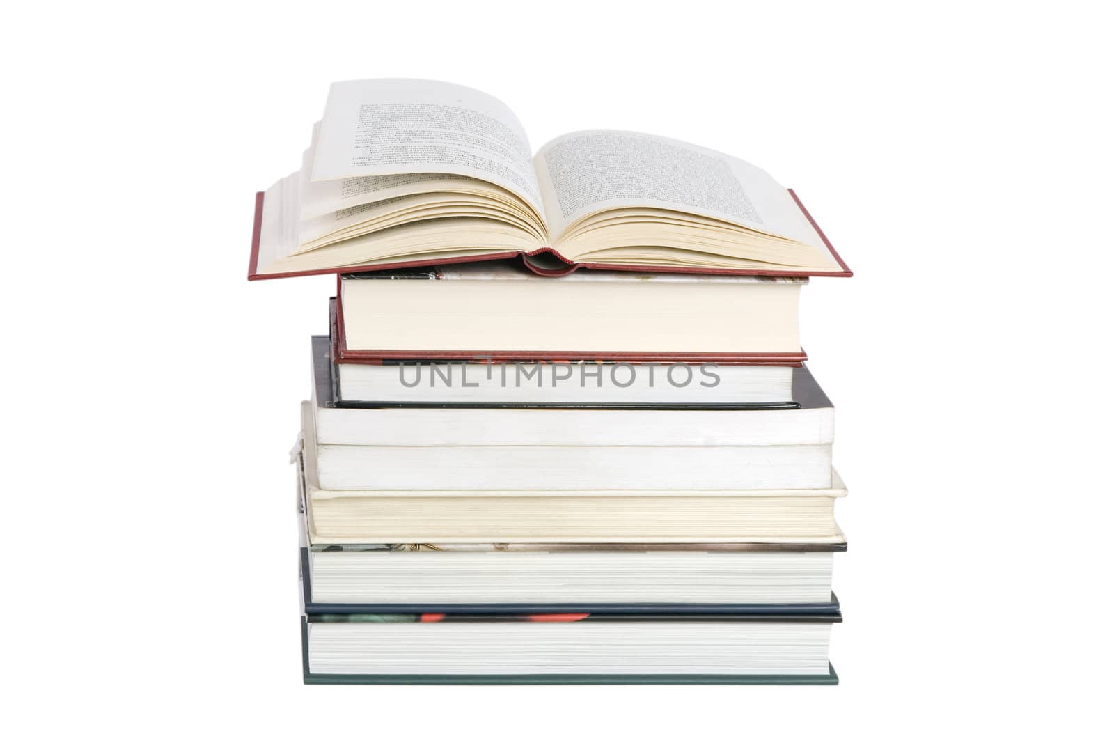 color tower books with open one arranged in stack 