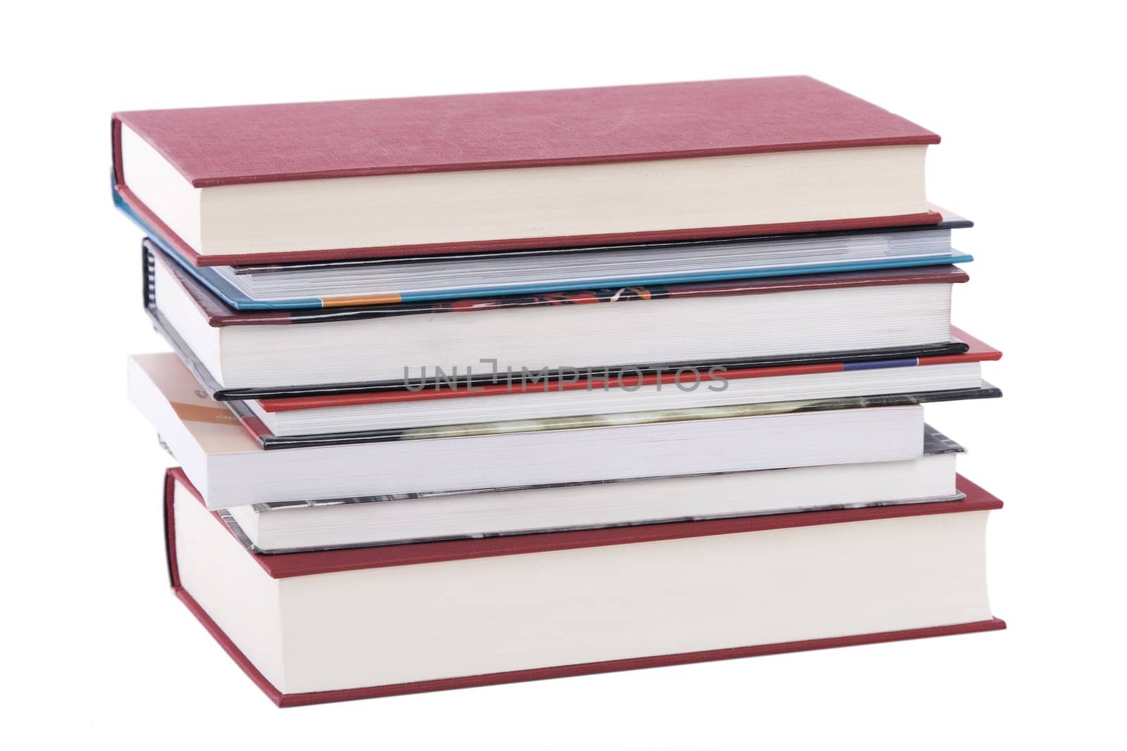 color tower books on white background arranged in stack