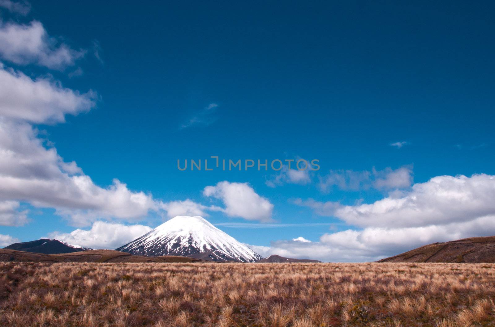 Mt Ngaurohoe in Tongariro National Park, New Zealand. Iconic snow-capped mountain was used in the Lord of the Rings movies and is better known as Mount Doom.