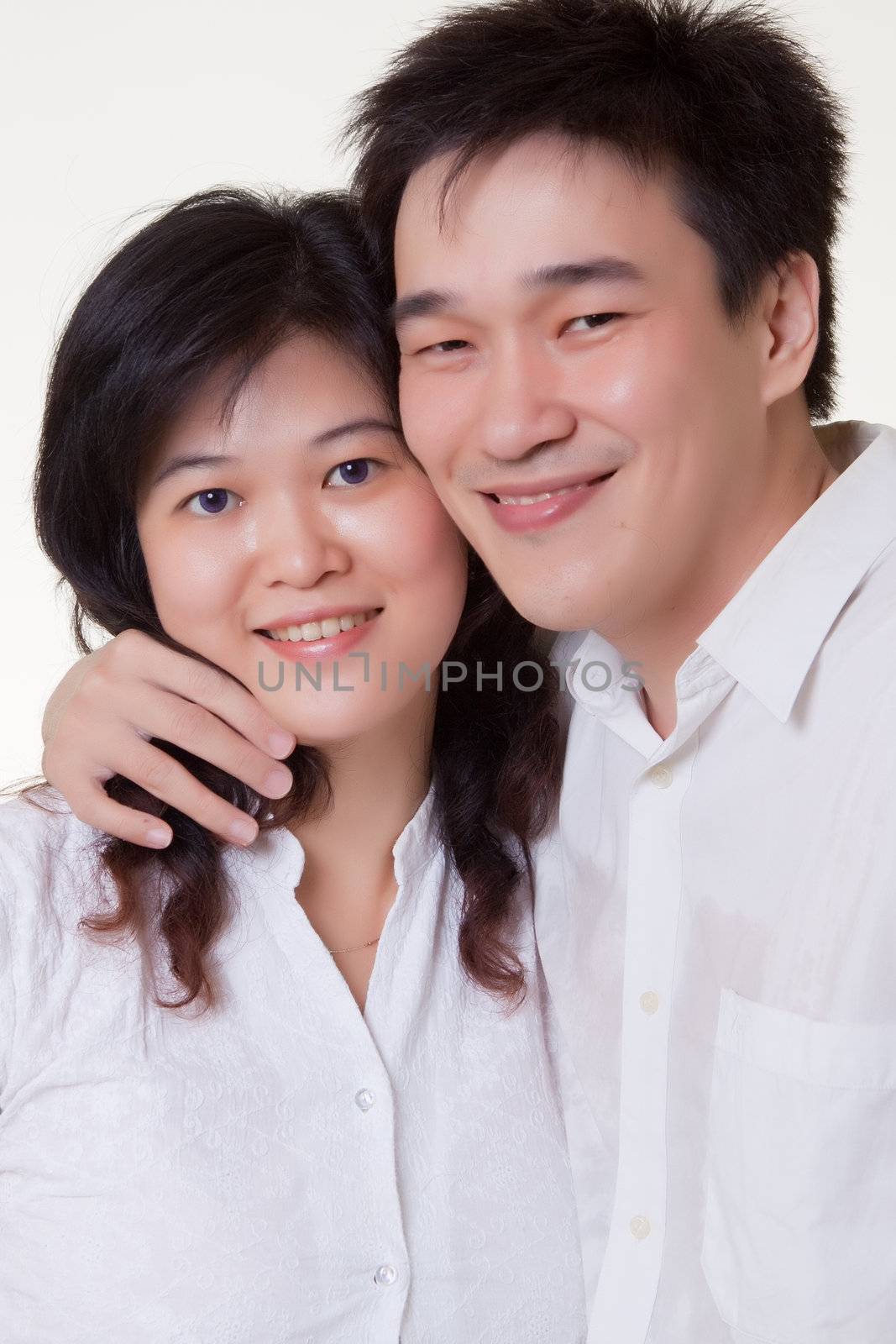 Young Indonesian Chinese Couple hugging 