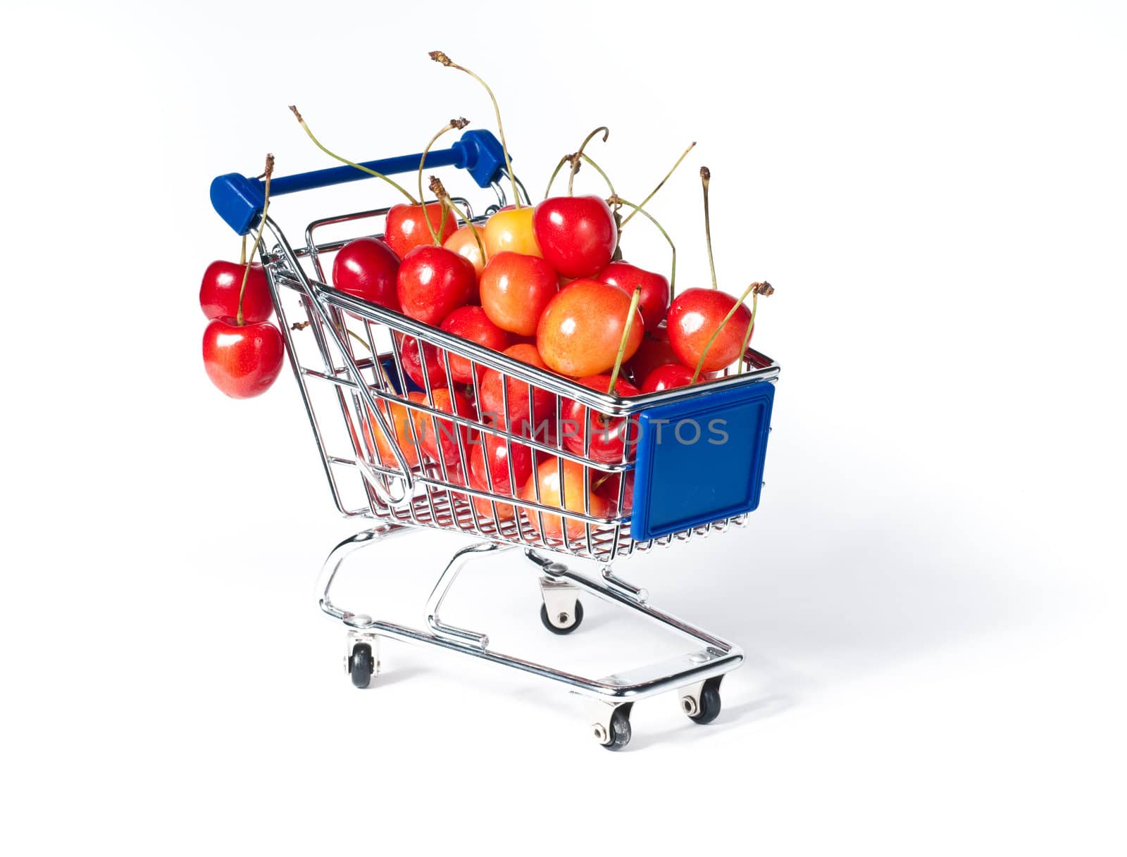 metal shopping trolley filled with cherry