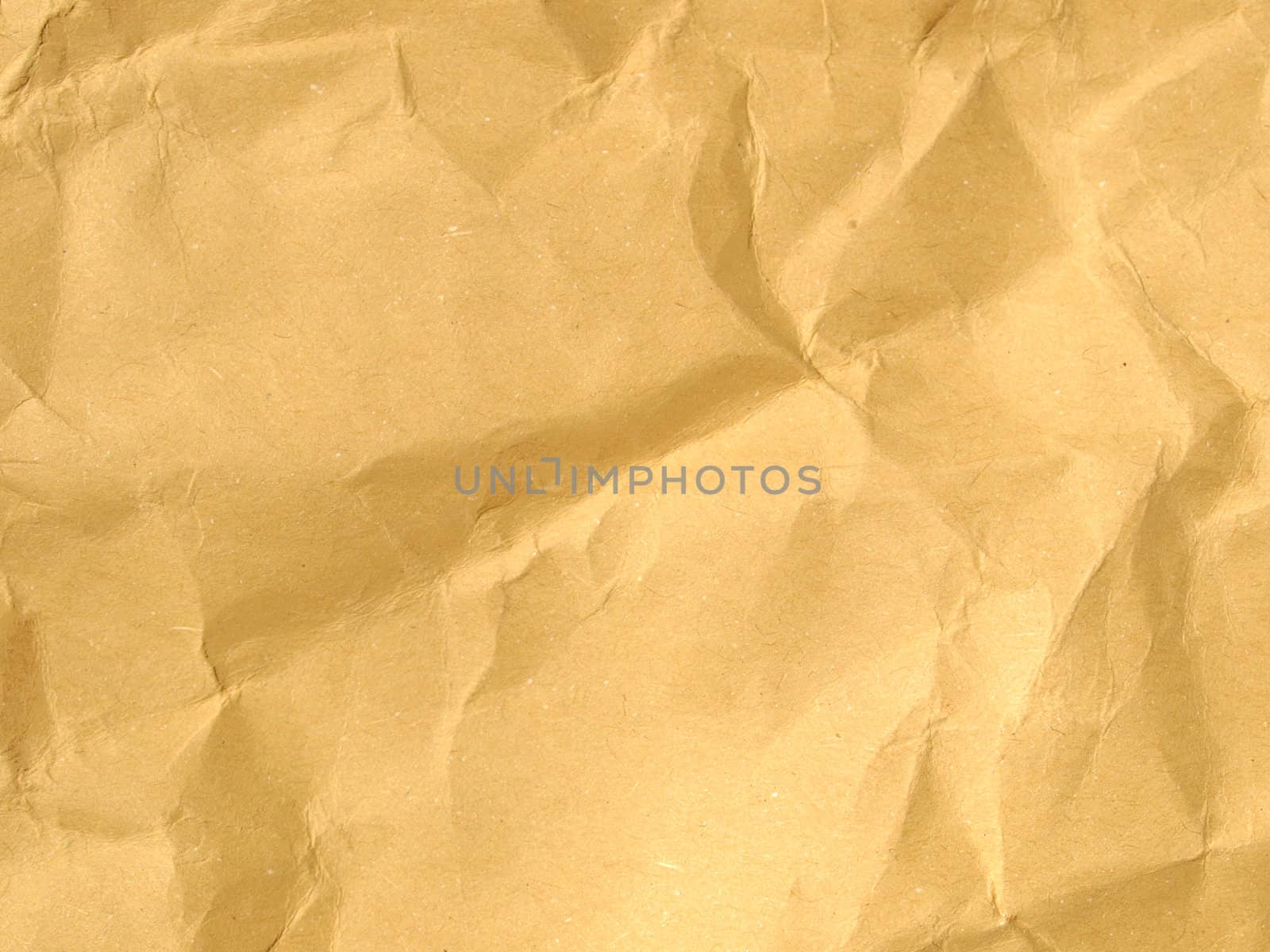 Sheet of brown and rippled paper background