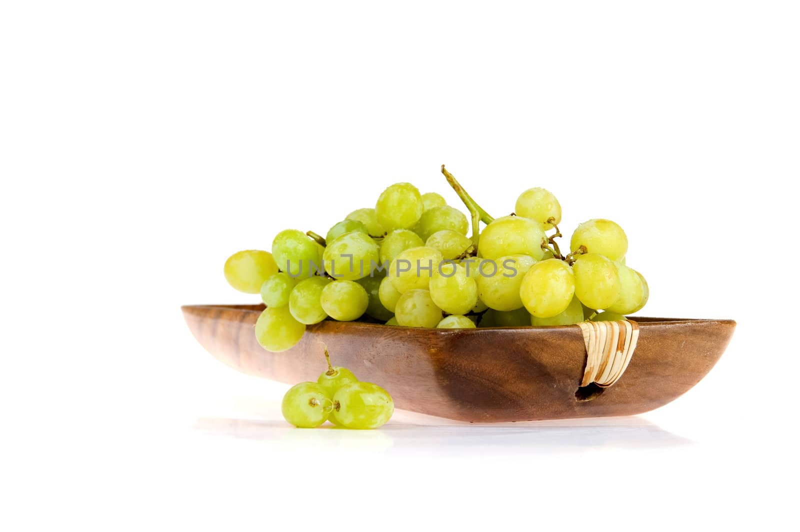 grapes in a wooden tray